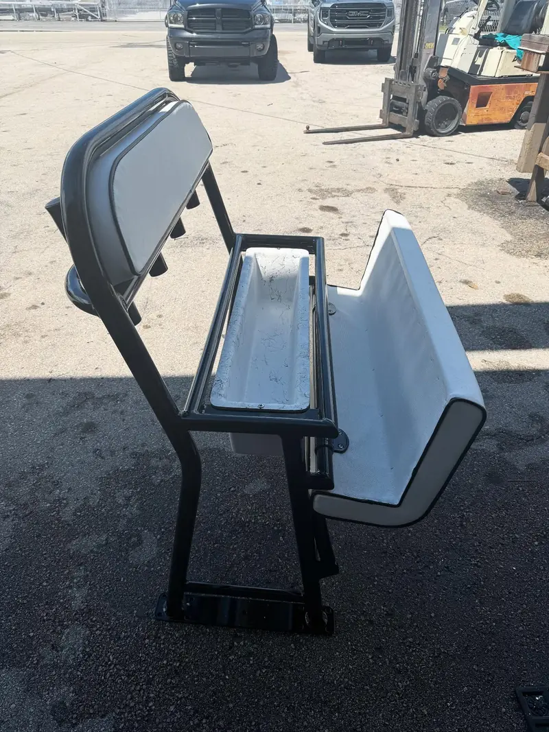 Black frame leaning post with white cushion and open storage
