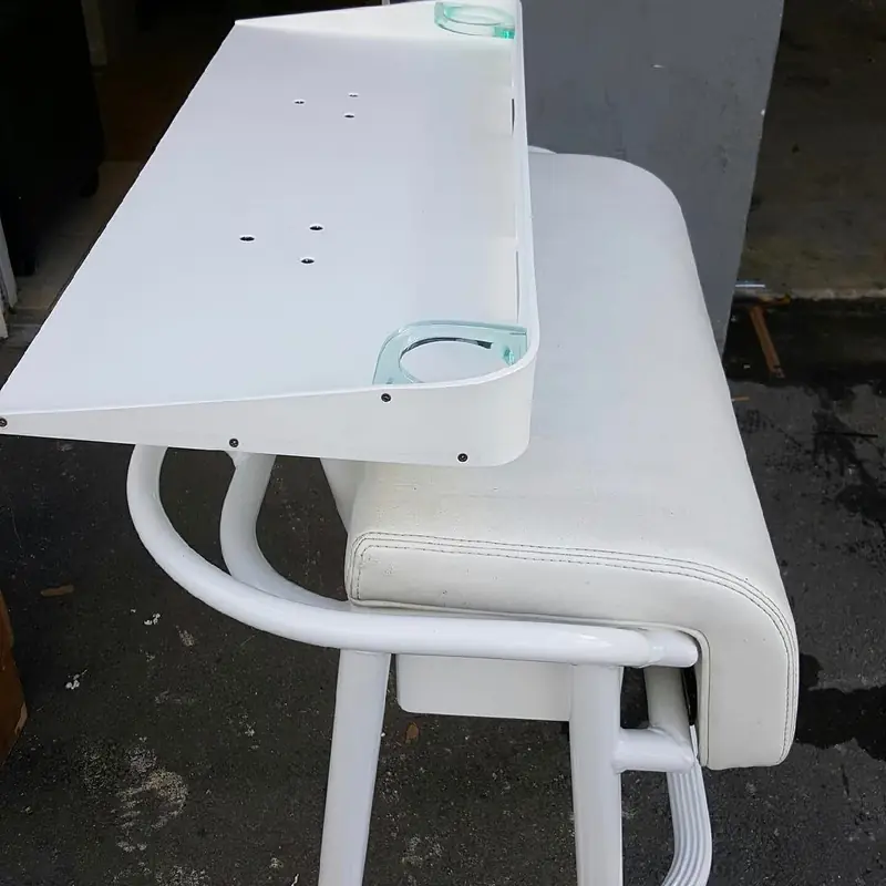 White leaning post with a built-in cutting board