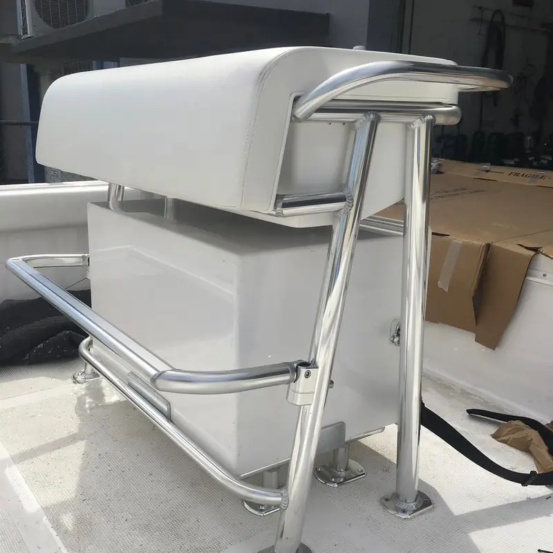 Leaning post with storage underneath and a leg support bar