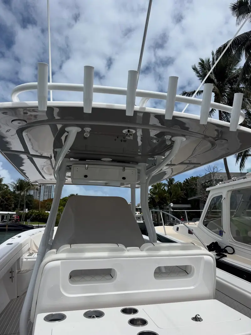 Custom rod holders across the rear of a hard top T-top