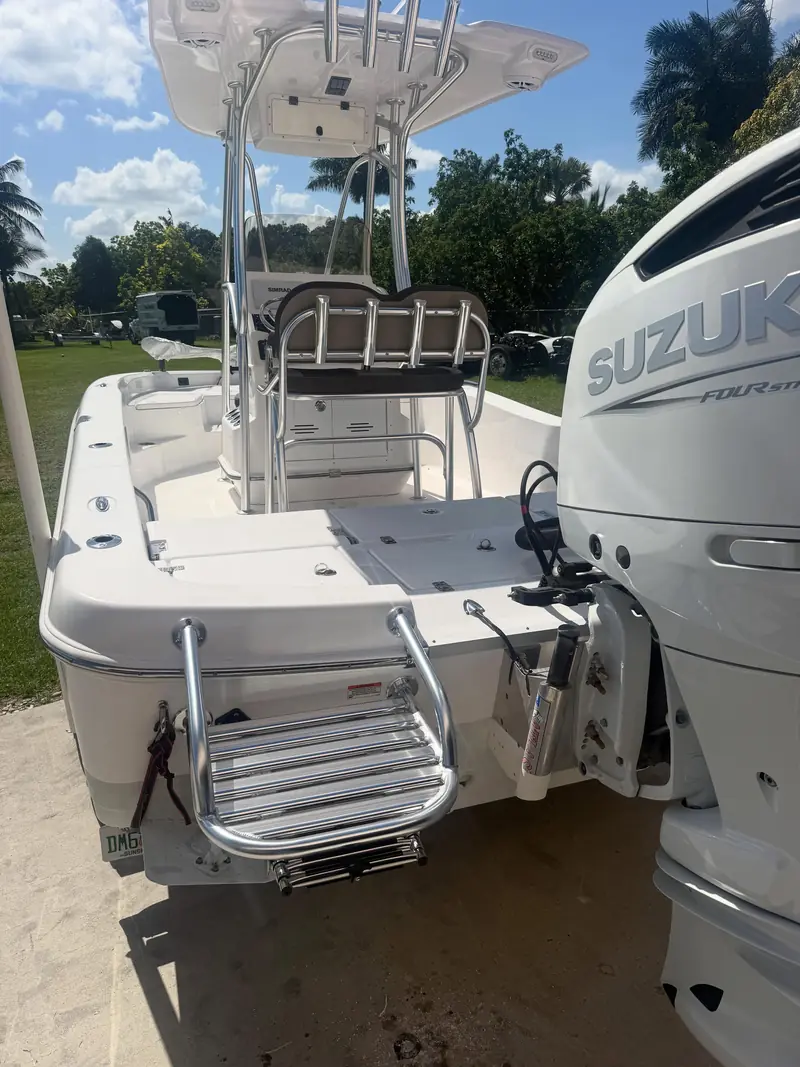 Custom swim platform with ladder on a bay boat