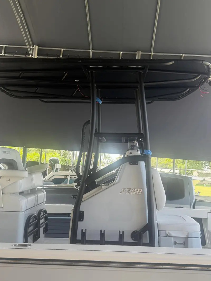 Black-on-black custom T-top with black canvas on a 25 ft Pathfinder