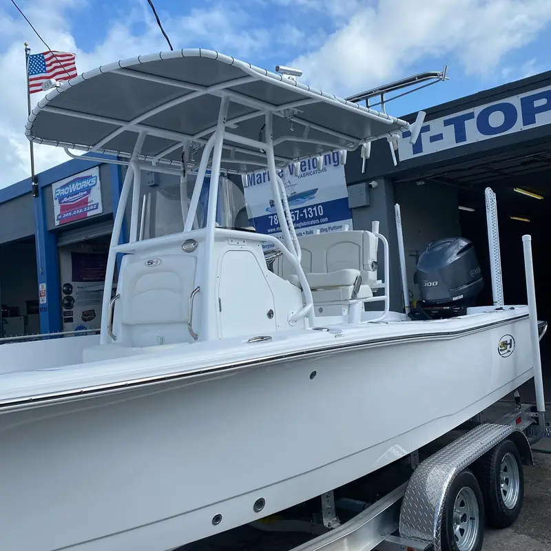 White-piped T-top with gray canvas on a SeaHunter center console