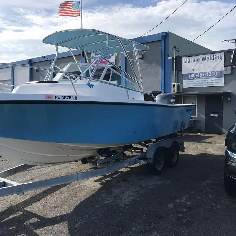 Aluminum top with rod holders on a walkaround boat