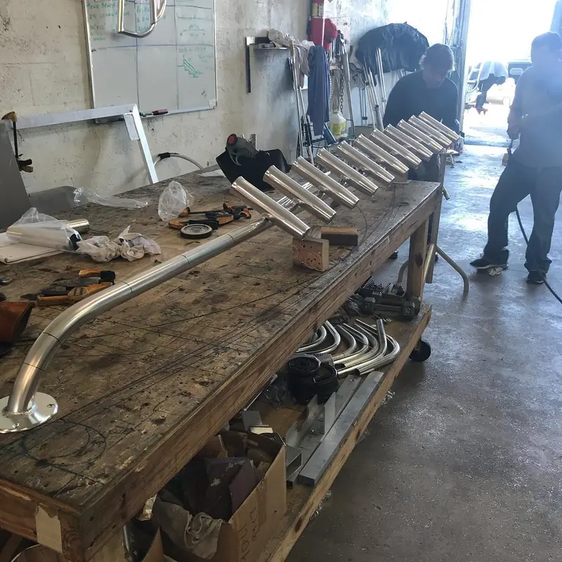 Wall-mount rod holders being built on the shop bench