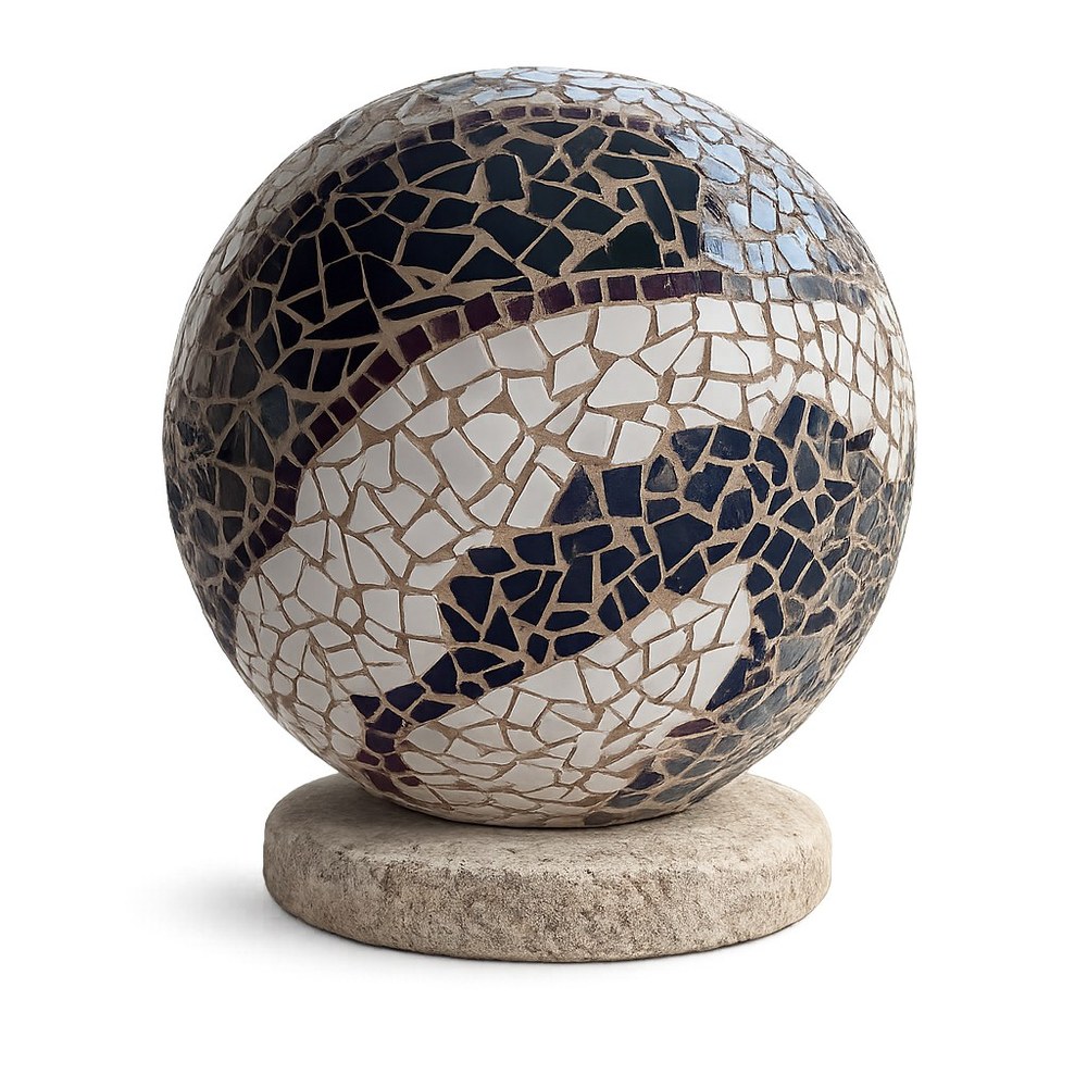 Blue, navy, and white glass-mosaic sphere on a stone base