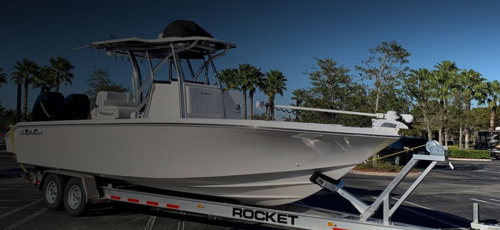 SeaHunter center console boat on a Rocket aluminum tandem axle trailer