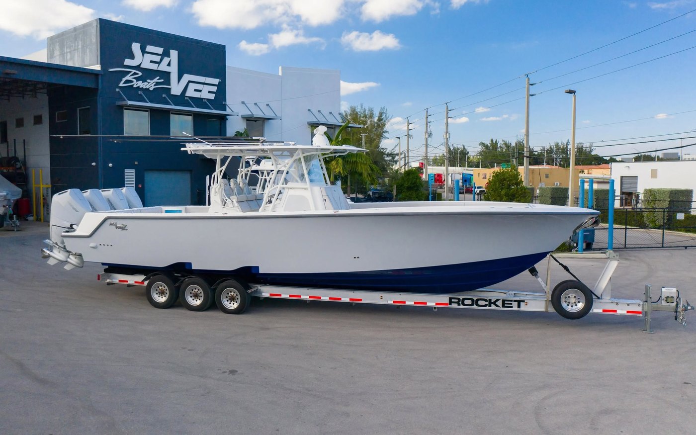 SeaVee center console boat on a Rocket triple axle aluminum trailer