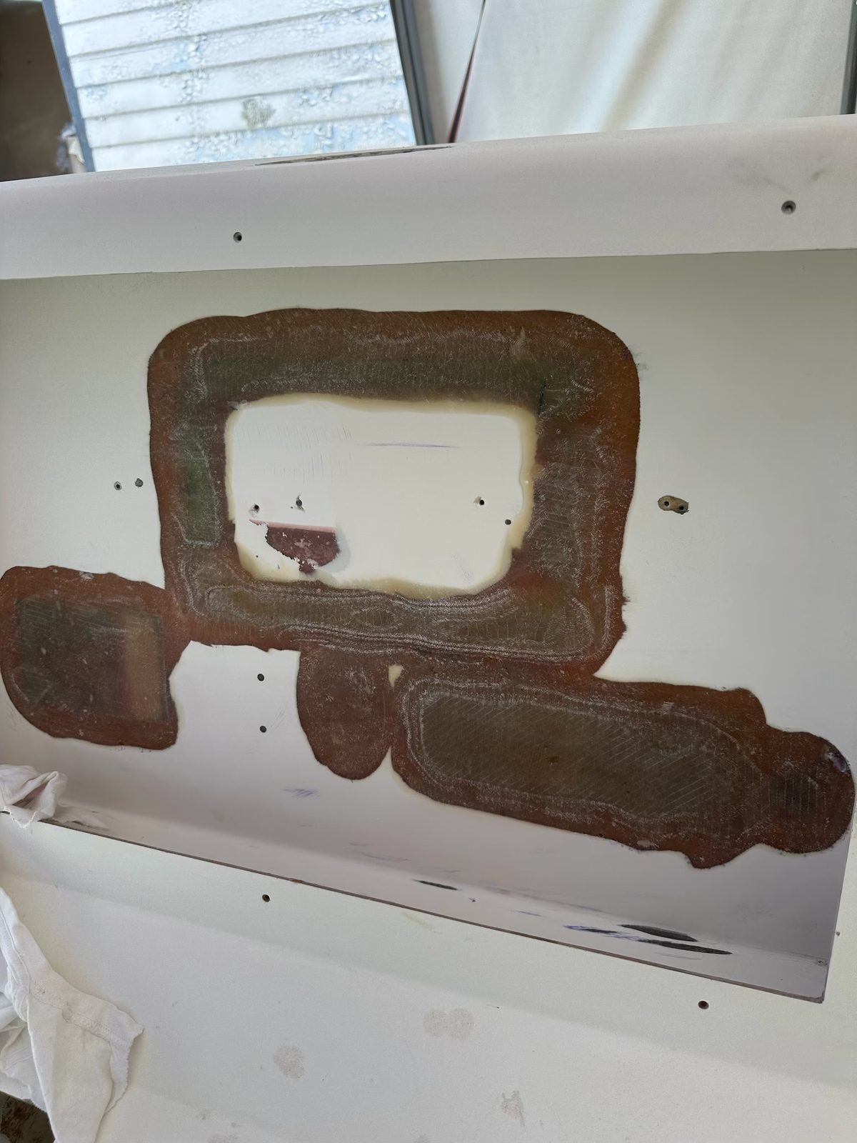 Fiberglass ground out and re-glassed during a structural repair
